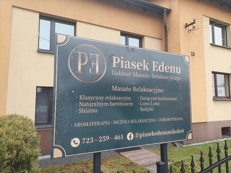 logo gabinetu masażu - logo na tle marki - Piasek Edenu